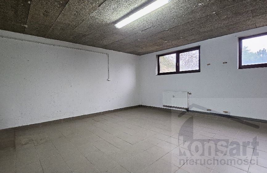 Lokal usługowy w podziemiu Apartamenty Pod Zegarem (1)